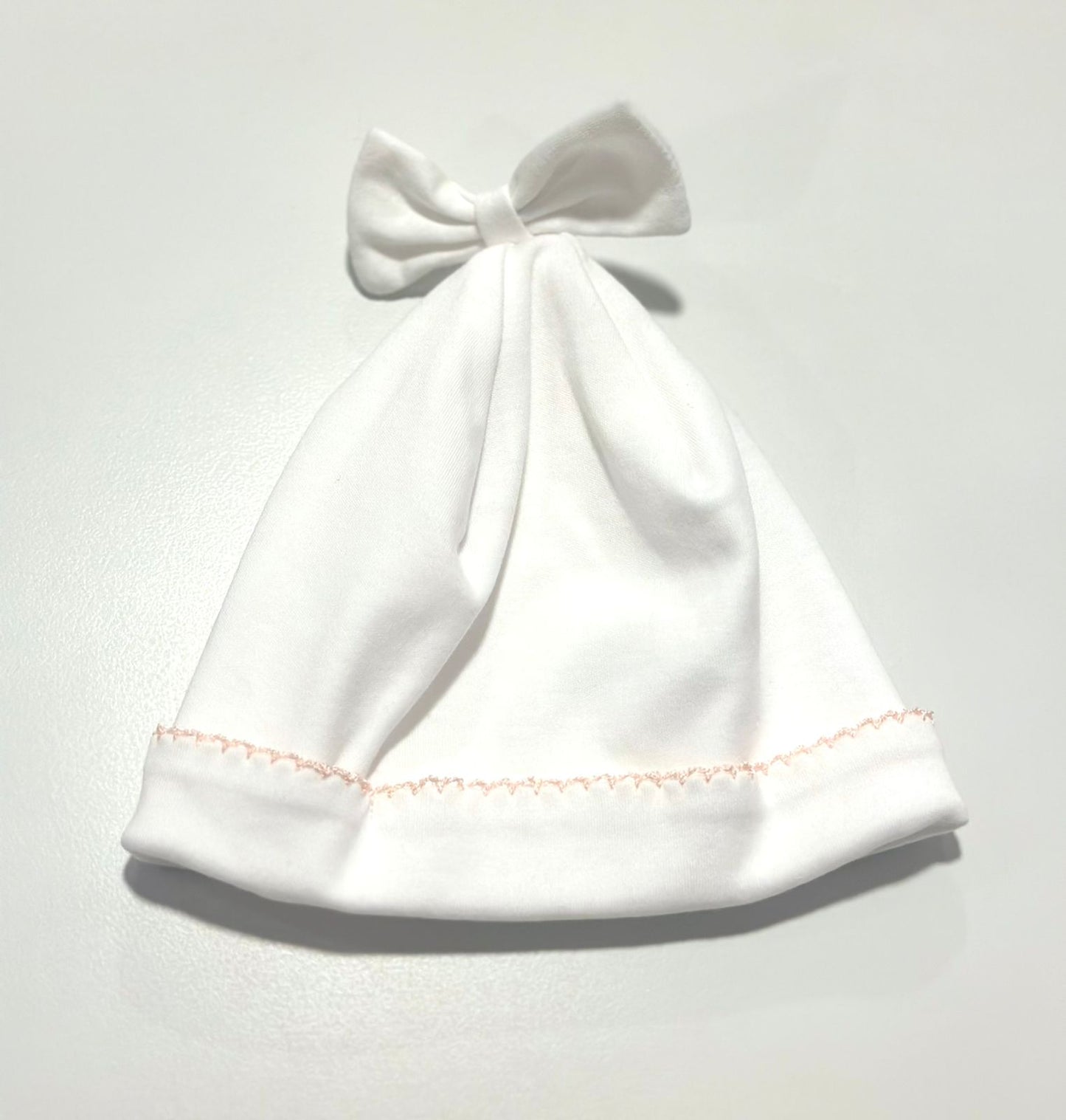 GORRITO BLANCO CON ROSA