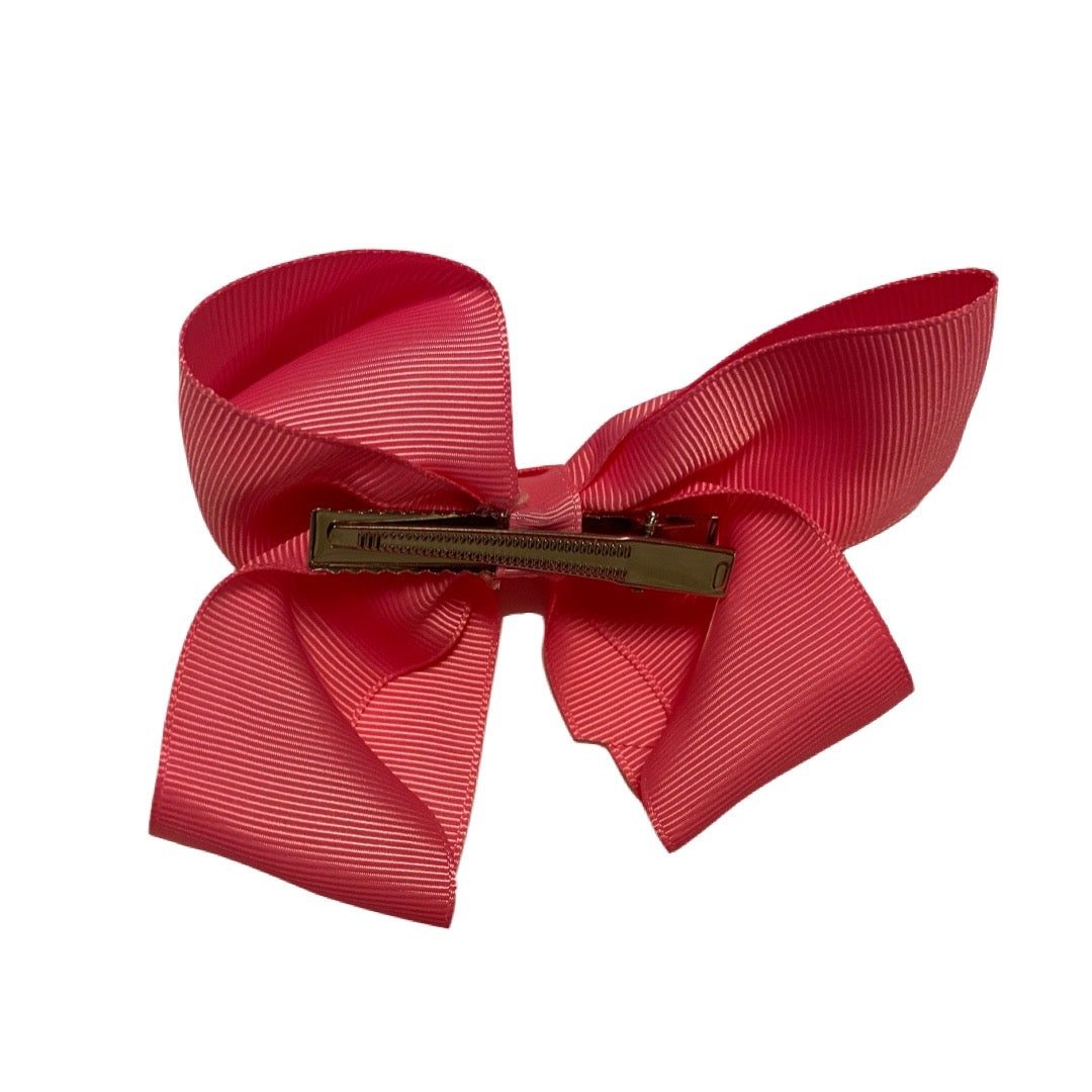 Vincha con clip y lazo fucsia